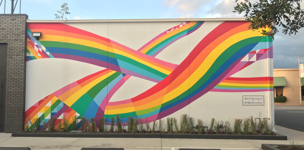 Michelle Hoogveld rainbow ribbon mural at 8532 Melrose Ave